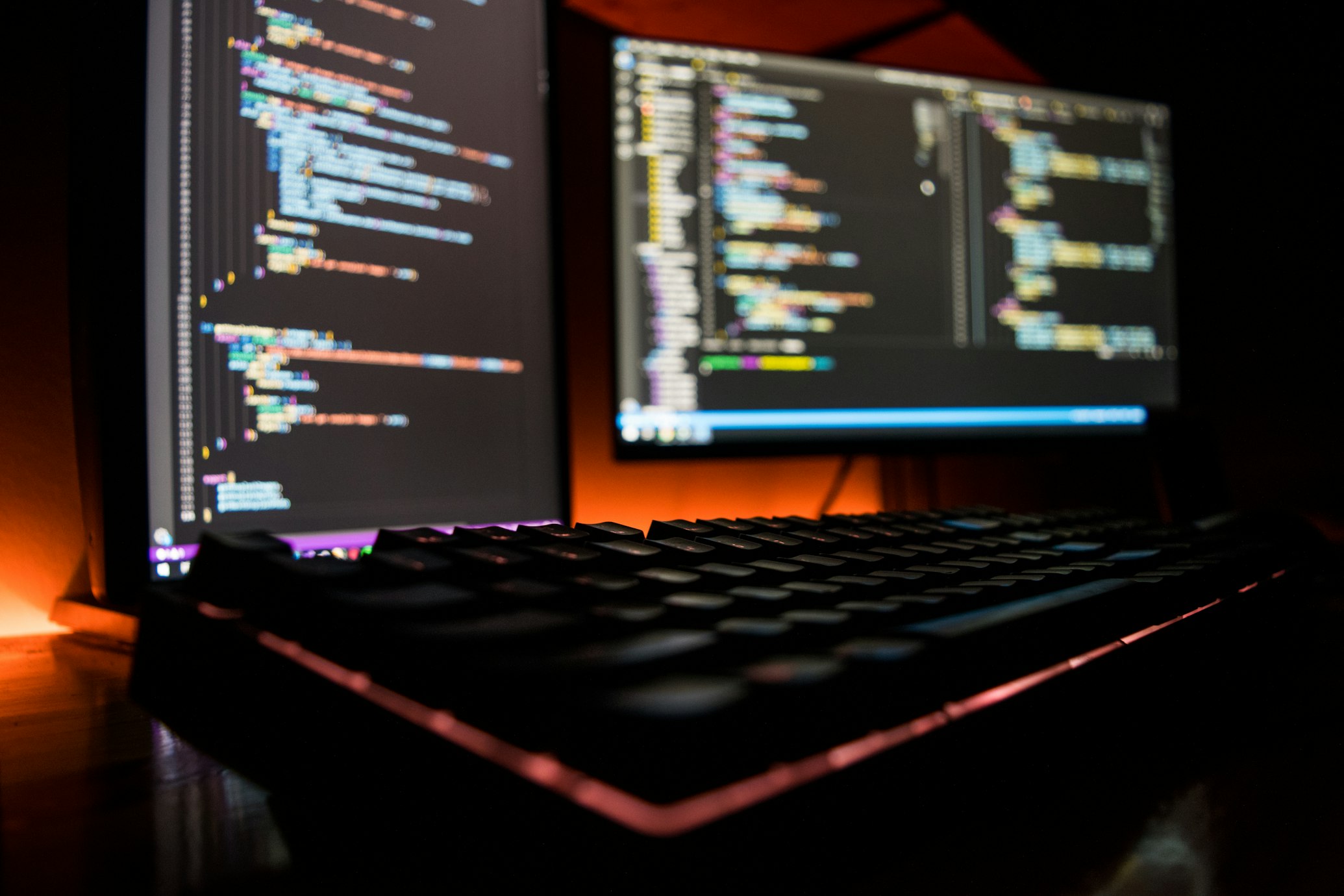 Computer code displayed on dual monitors (October 15, 2019)